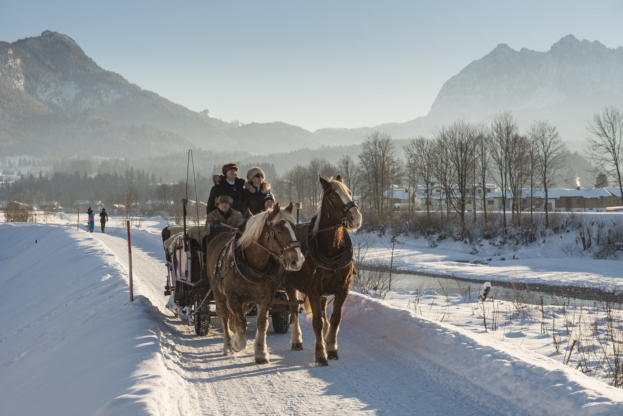 Kaiserwinkl-Urlaub-Winteraktivitaeten-Winter-Kutschenfahrt-Kutschenfahren